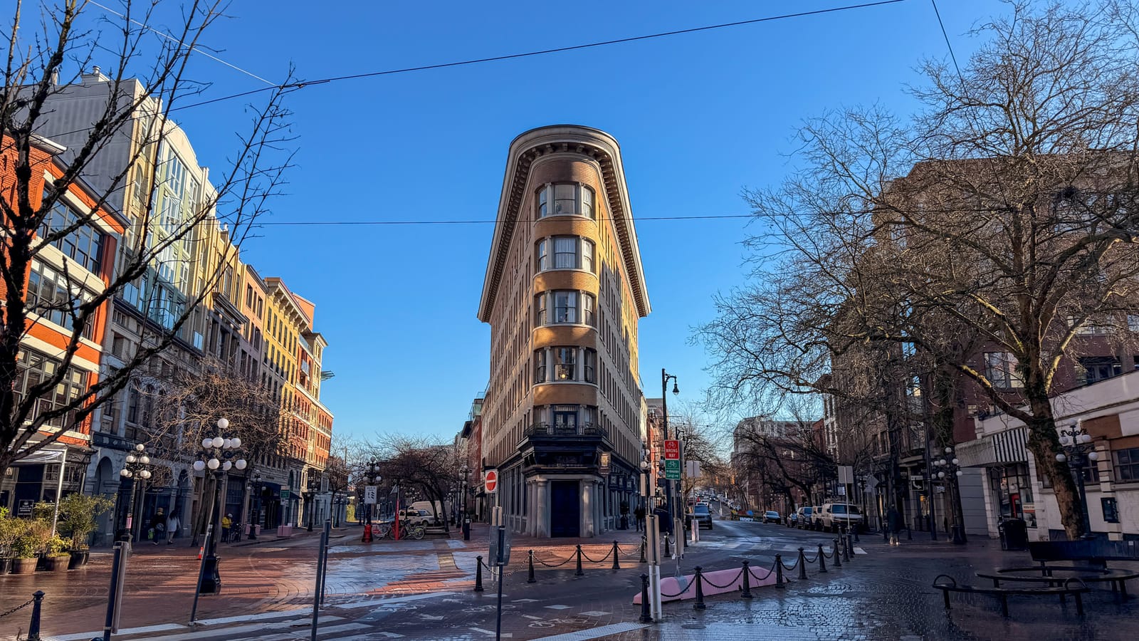 The flatiron Hotel Europe building where Water Street meets Powell Street in Gastown, on a winter morning